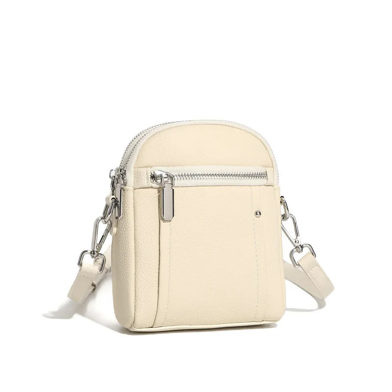 Women's mini genuine leather crossbody bag in beige white — compact saddle shoulder bag 14x7x18cm