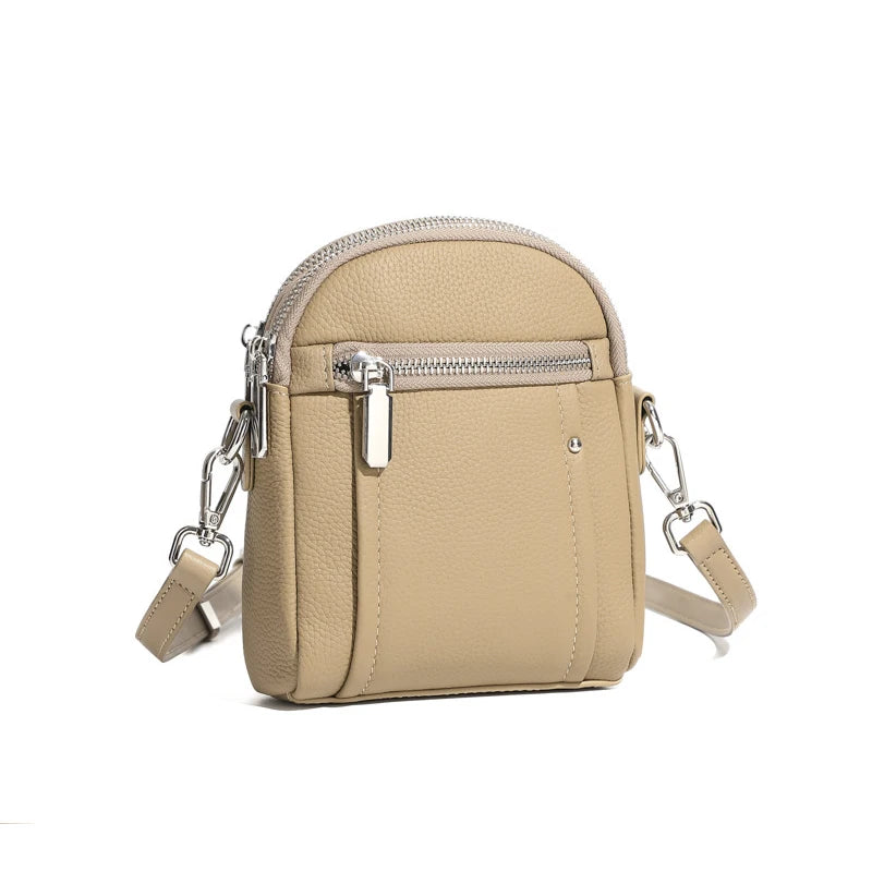Women's mini genuine leather crossbody bag in elephant grey — compact saddle shoulder bag