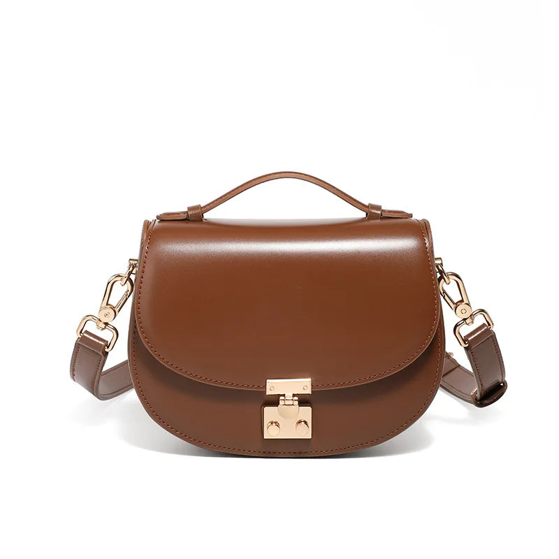 Women's buckle saddle bag in brown — retro crossbody shoulder handbag
