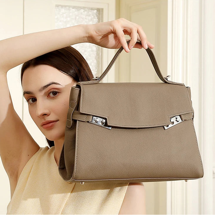 Woman Holding the P112 Genuine Leather Shoulder Bag - Carry-Work